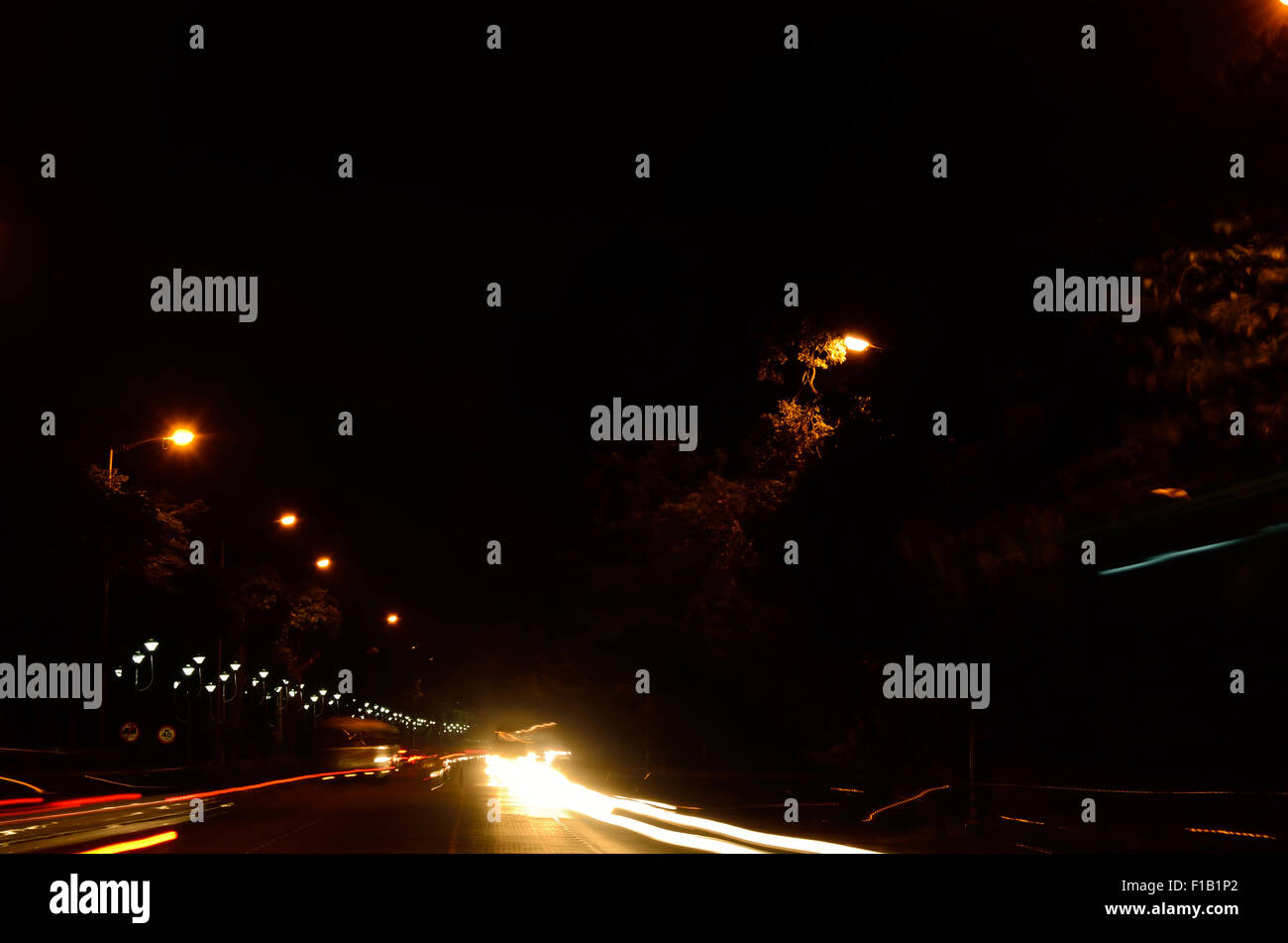 Light tail of traffic in road Stock Photo