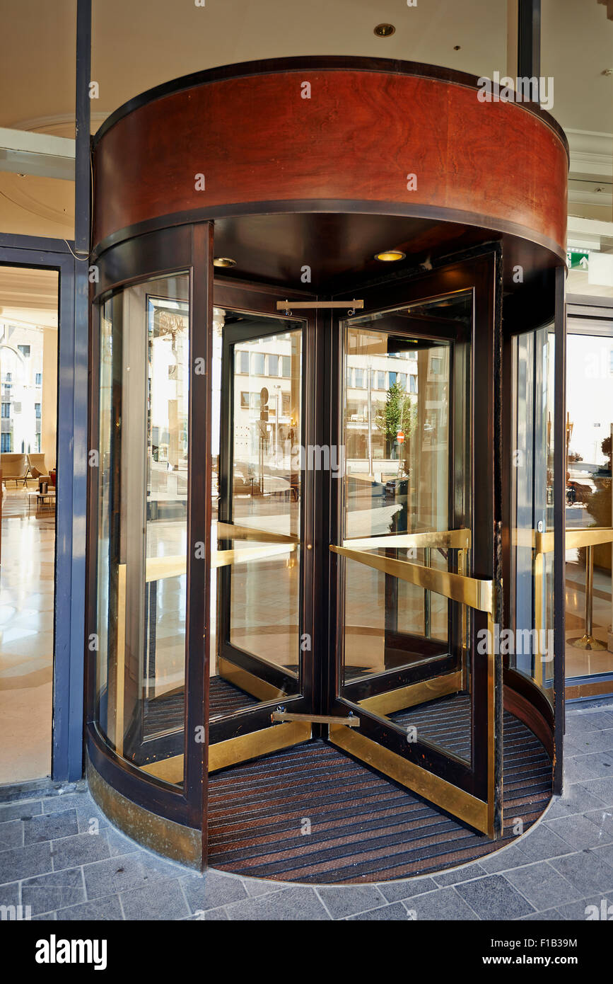 The main entrance and the Glass revolving door at Hotel Hilton Grand