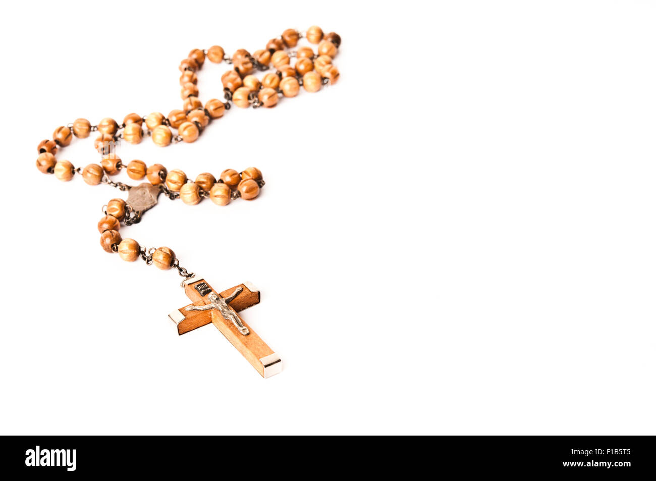 Catholic wooden rosary isolated Stock Photo - Alamy