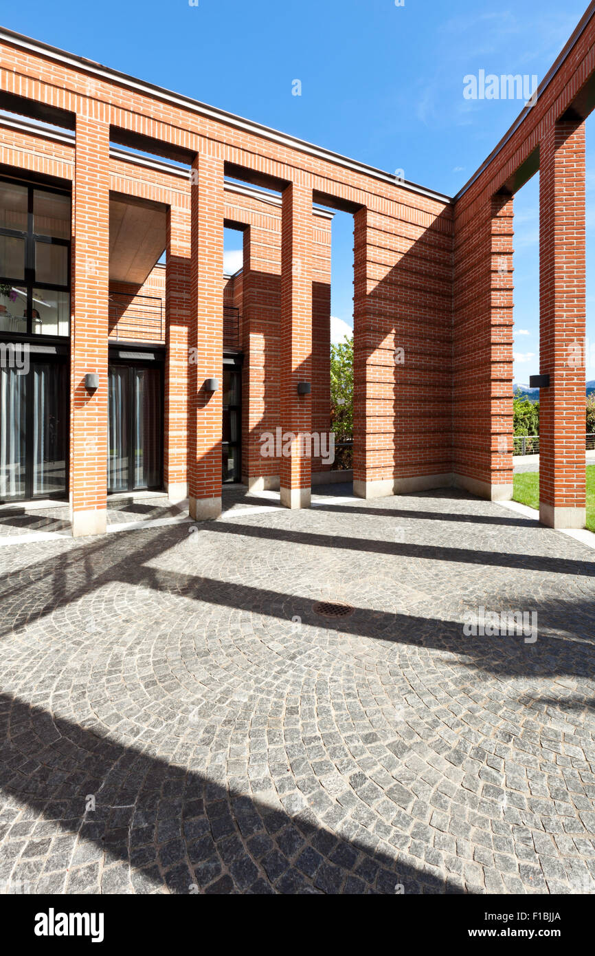 modern bricks house, patio with columns Stock Photo Alamy