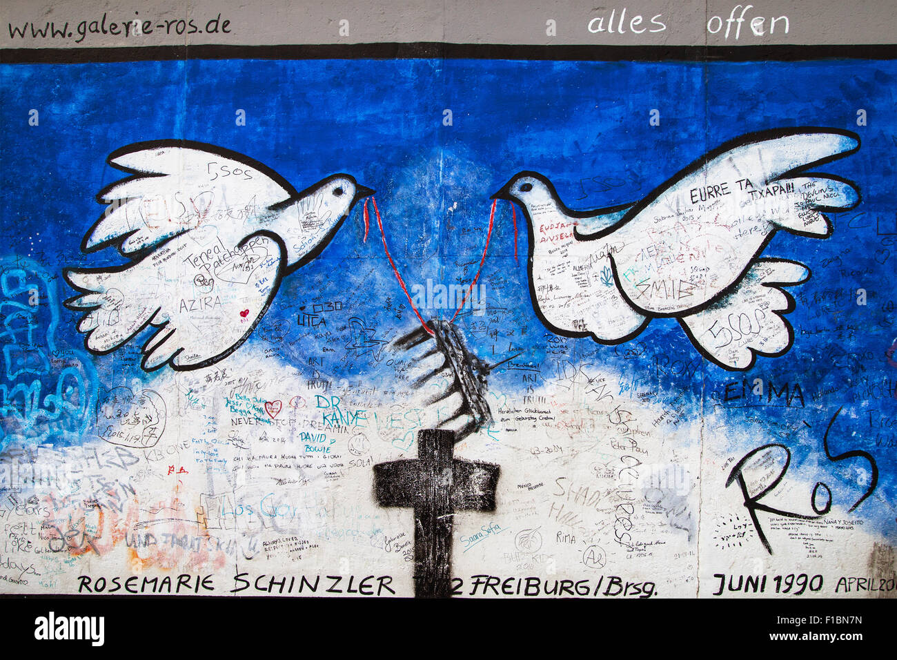 Mural 'Alles offen' by Rosemarie Schinzler on the East Side Gallery, Berlin, Germany. Stock Photo