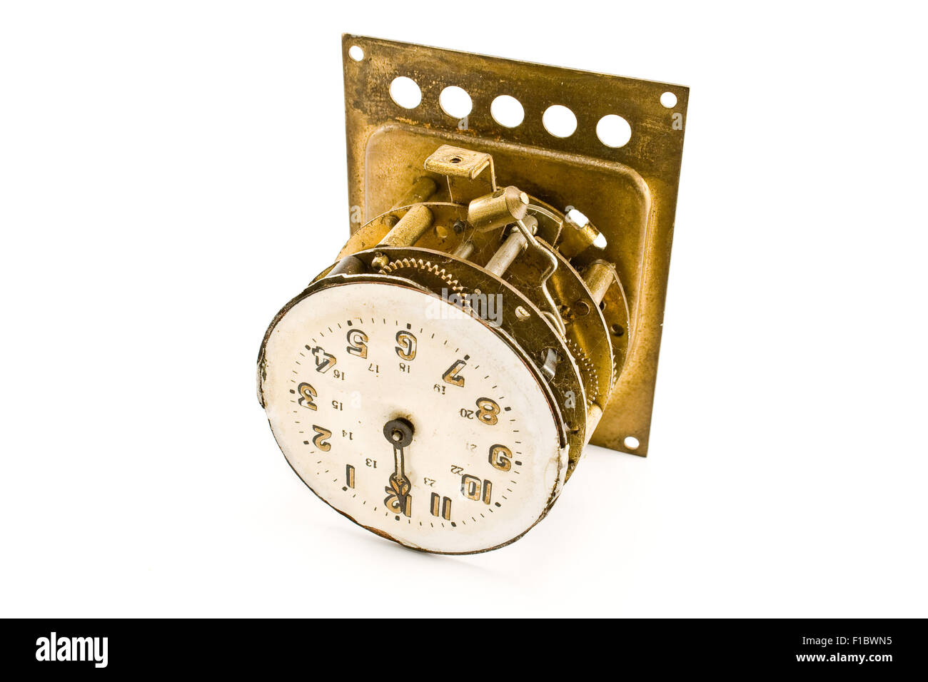 Inside of the antique vintage clock - mechanism - isolated on white Stock Photo