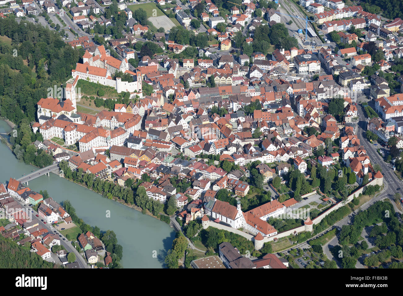 AERIAL VIEW. Old town of Füssen on the left bank of the Lech River. Bavaria, Germany. Stock Photo
