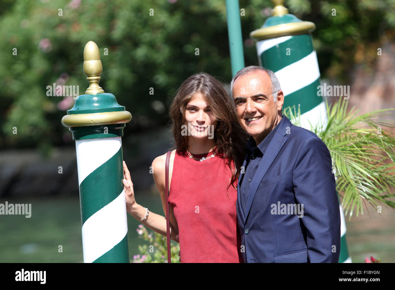 ITALY, Venice : Elisa Sednaoui (L) , the patroness of the 72th Venice International Film Festival with Director of the Venice Film Festival Alberto Barbera during the 72th Venice Film Festival at Venice on September 01, 2015 Stock Photo