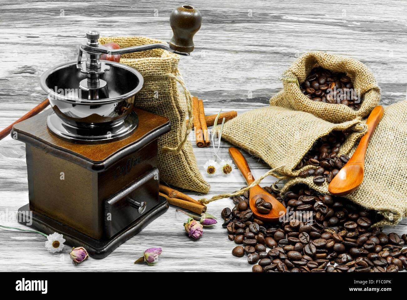 Still life coffee beans, coffee grinder and cinnamon Stock Photo