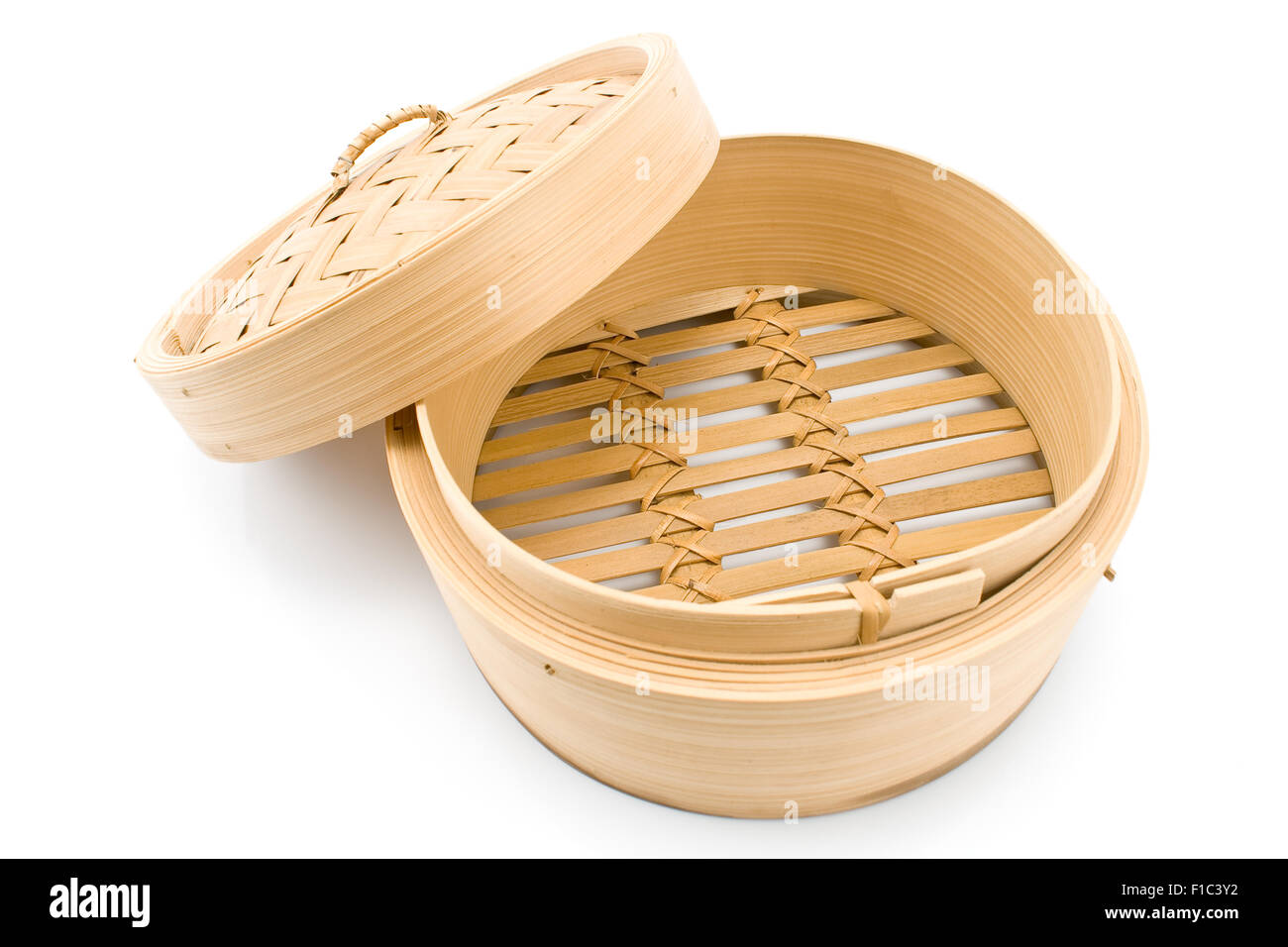 Bamboo basket steamer with open lid isolated on white Stock Photo Alamy