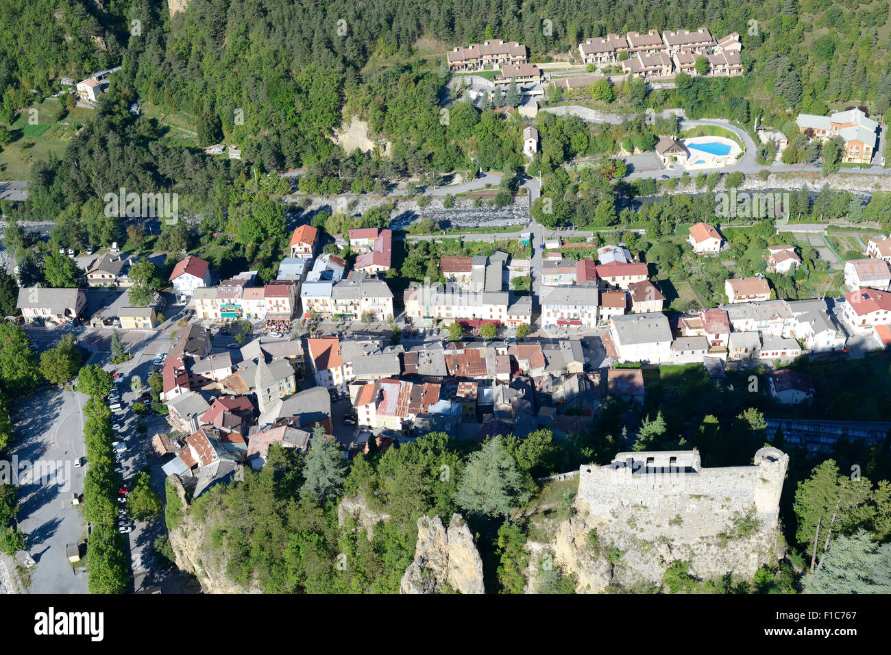 AERIAL VIEW. Ruins of a medieval castle overlooking the village of Guillaumes on the left bank of the Var River. Alpes-Maritimes, France. Stock Photo