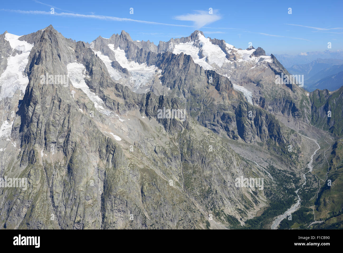AERIAL VIEW. Aiguille de Leschaux (left, elevation: 3859m) and Mont Dolent (right, elevation: 3820m). Val Ferret, Courmayeur, Aosta Valley, Italy. Stock Photo