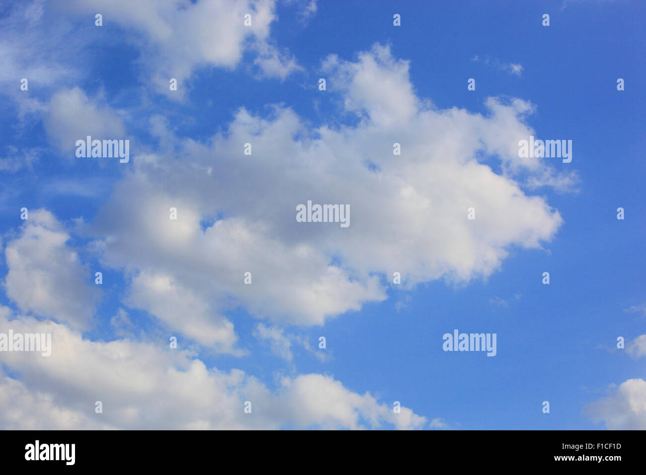 blue sky with some white clouds in summer Stock Photo - Alamy
