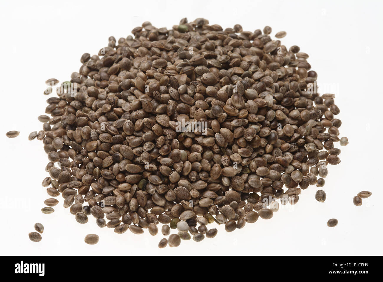 Hemp seeds or hemp nuts are a high-protein food source Stock Photo