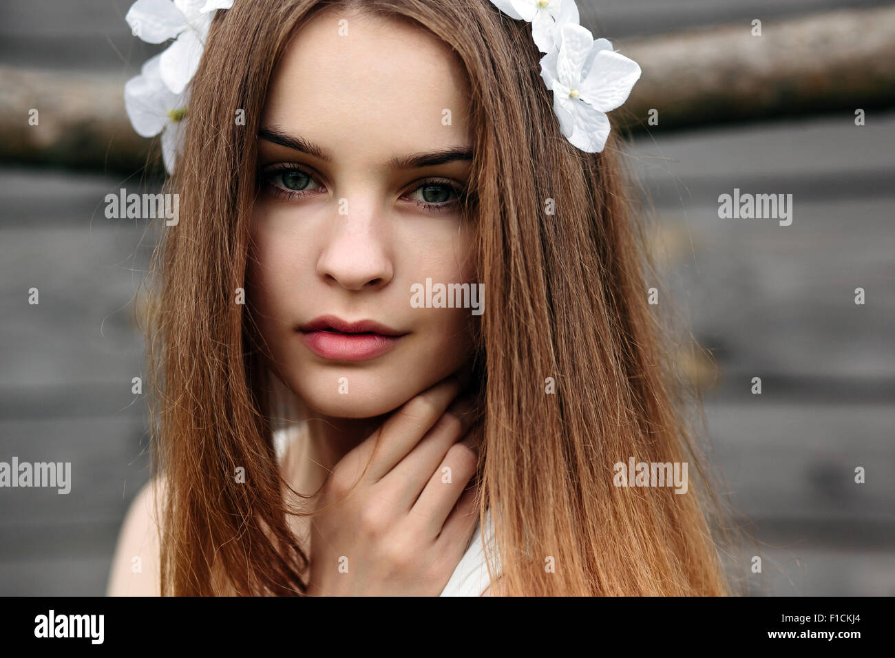 Girl climbing ladder into tree house