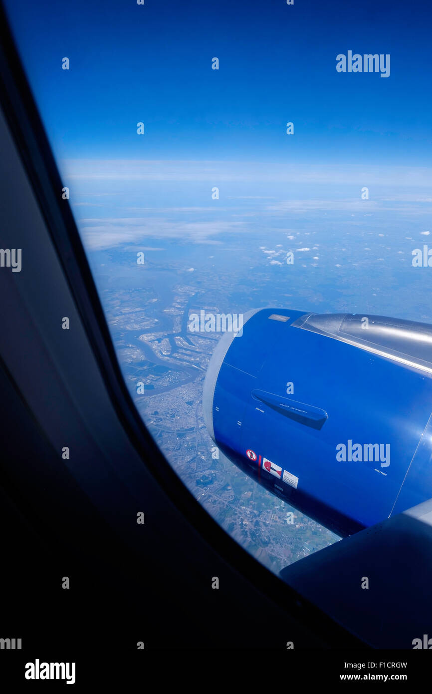 Aerial view of Dutch coast from BA Airbus 320 showing engine. Stock Photo