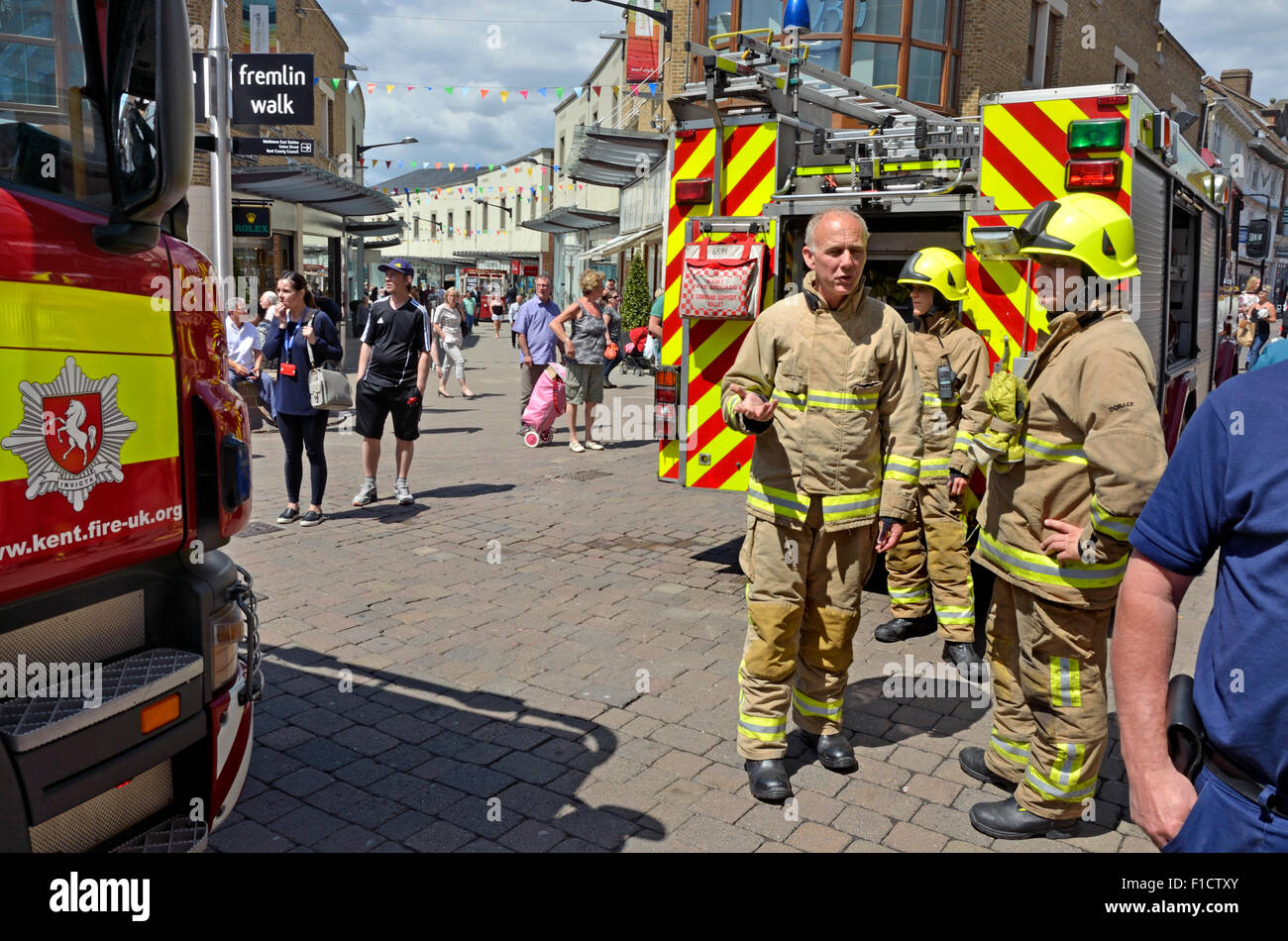 Maidstone, Kent, England, UK. Fire crew in the town centre attending a