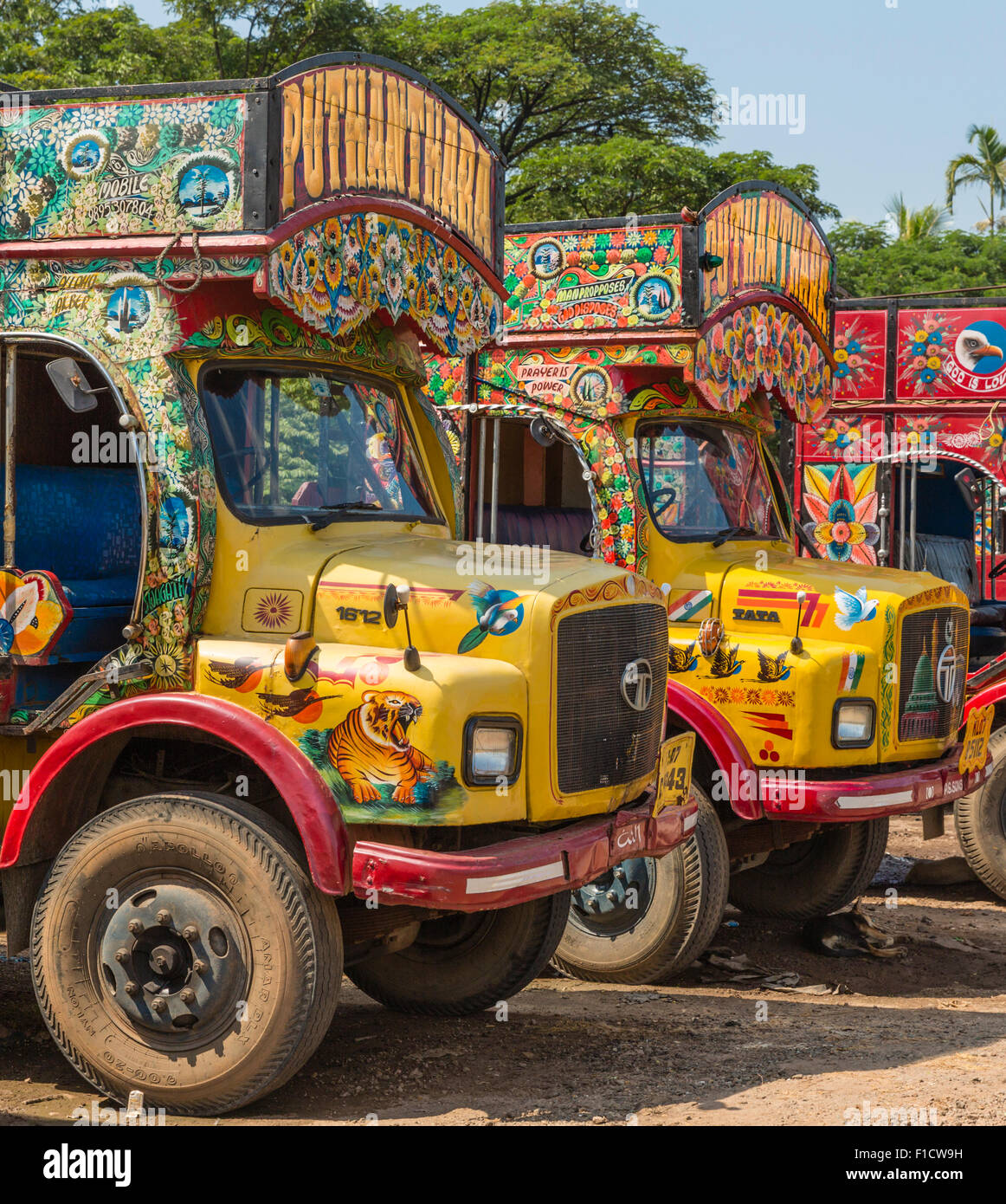 Decorated long distance trucks parked by roadside in Kochi, Kerala, India Stock Photo