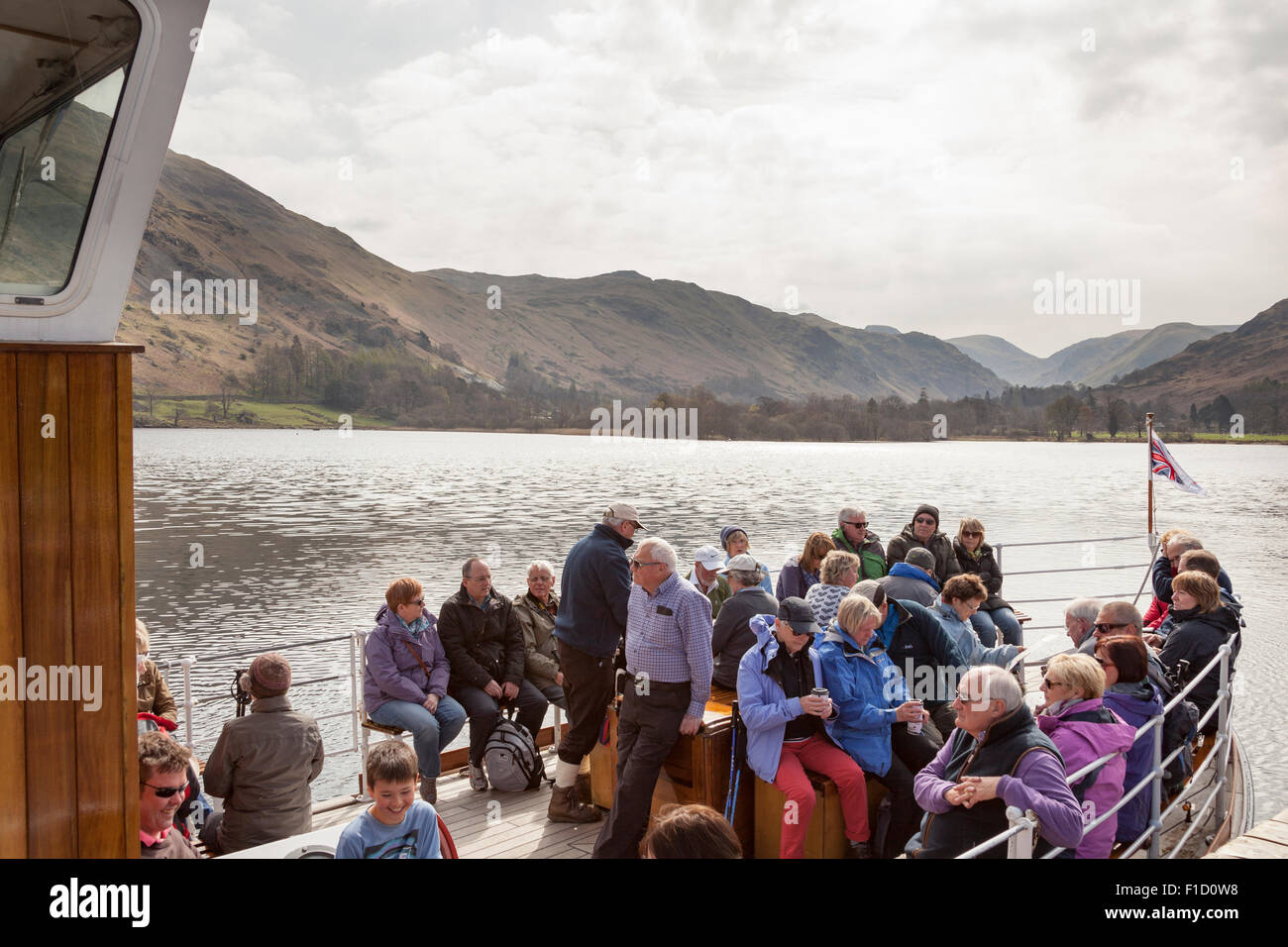 Tourists on an Ullswater steamer, Glenridding Pier, Lake Ullswater, Glenridding, Lake District, Cumbria, England Stock Photo