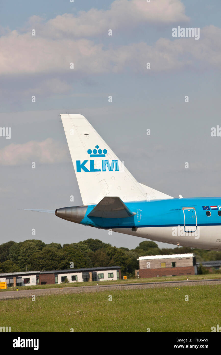 Tail fin of an Embraer 190 KLM plane at Leeds Bradford Airport. Stock Photo
