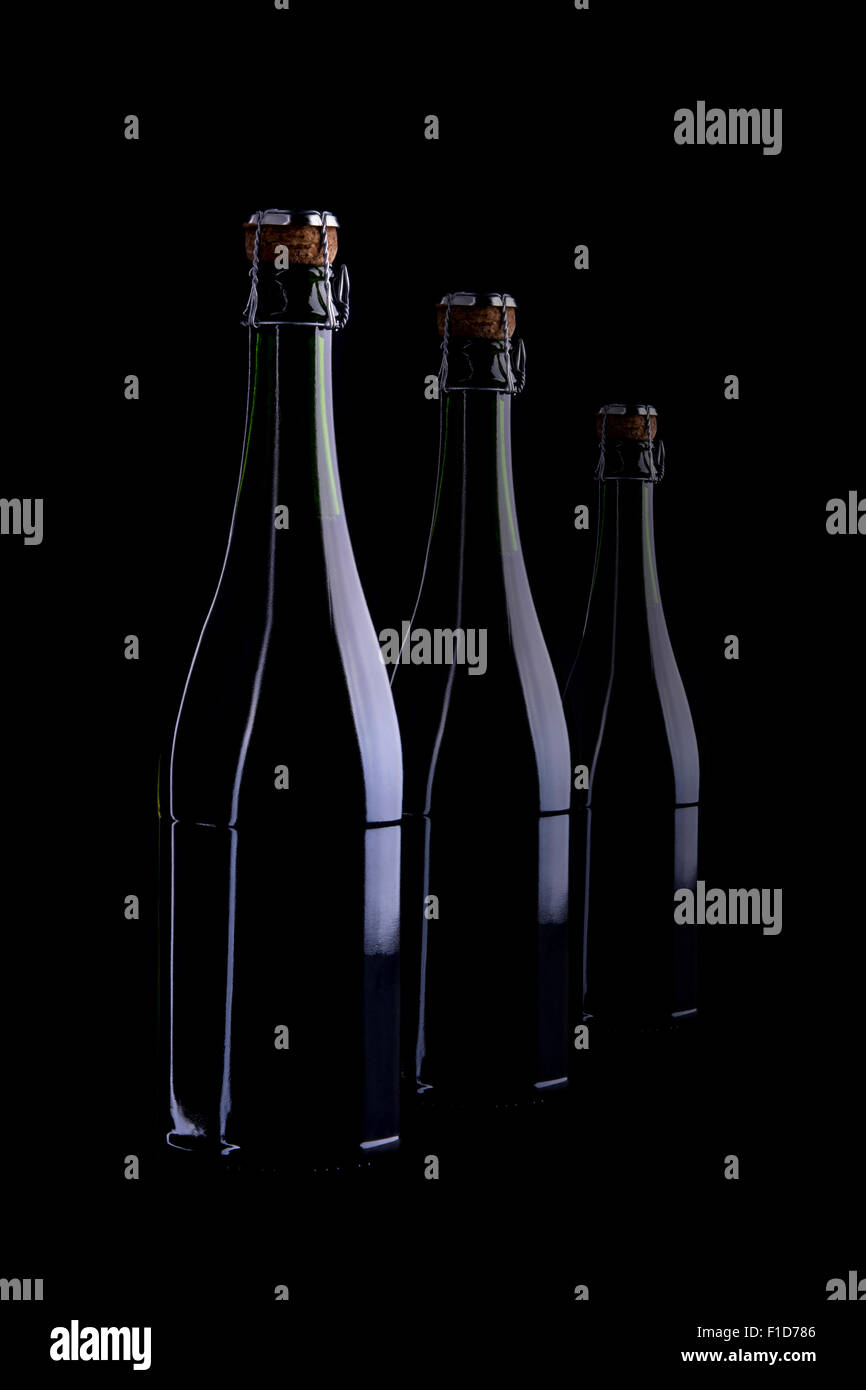 Wine bottle, still life profile, isolated on black background Stock Photo