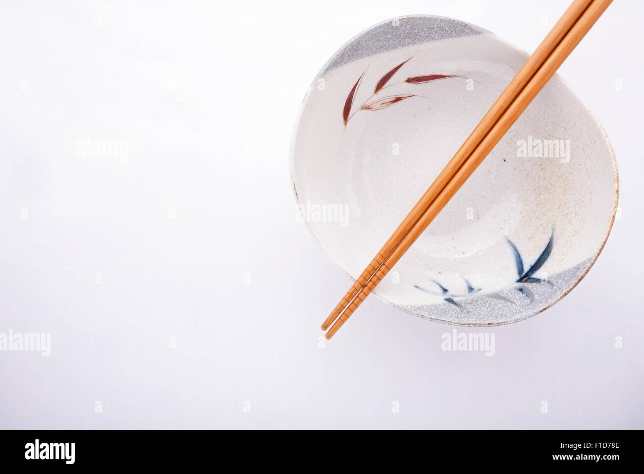 Traditional Japanese bowl with chopsticks Stock Photo Alamy