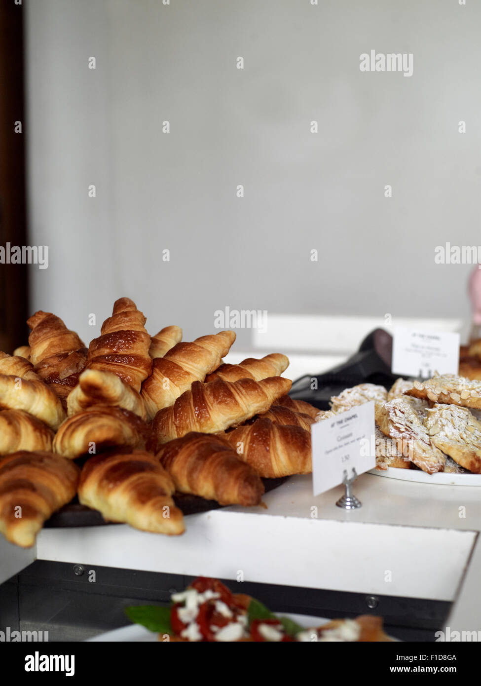 Paitsserie with display of croissasnt and pastries Stock Photo