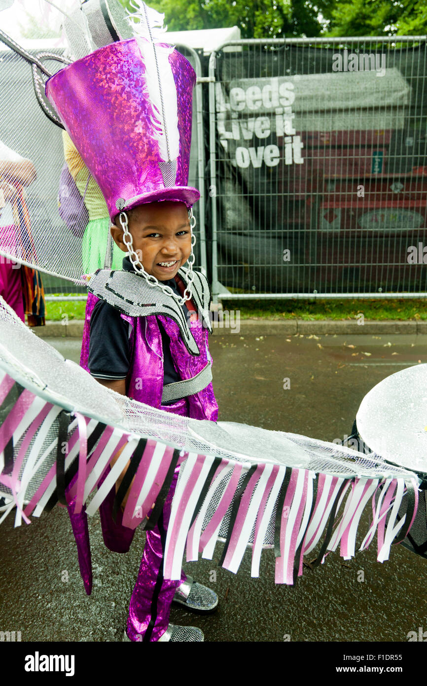 Leeds, West Yorkshire, UK. 31st August, 2015. A young boy dressed as a drummer boy smiles for the camera in Potternewton Park, Leeds, West Yorkshire UK Credit:  Graham Hardy/Alamy Live News Stock Photo