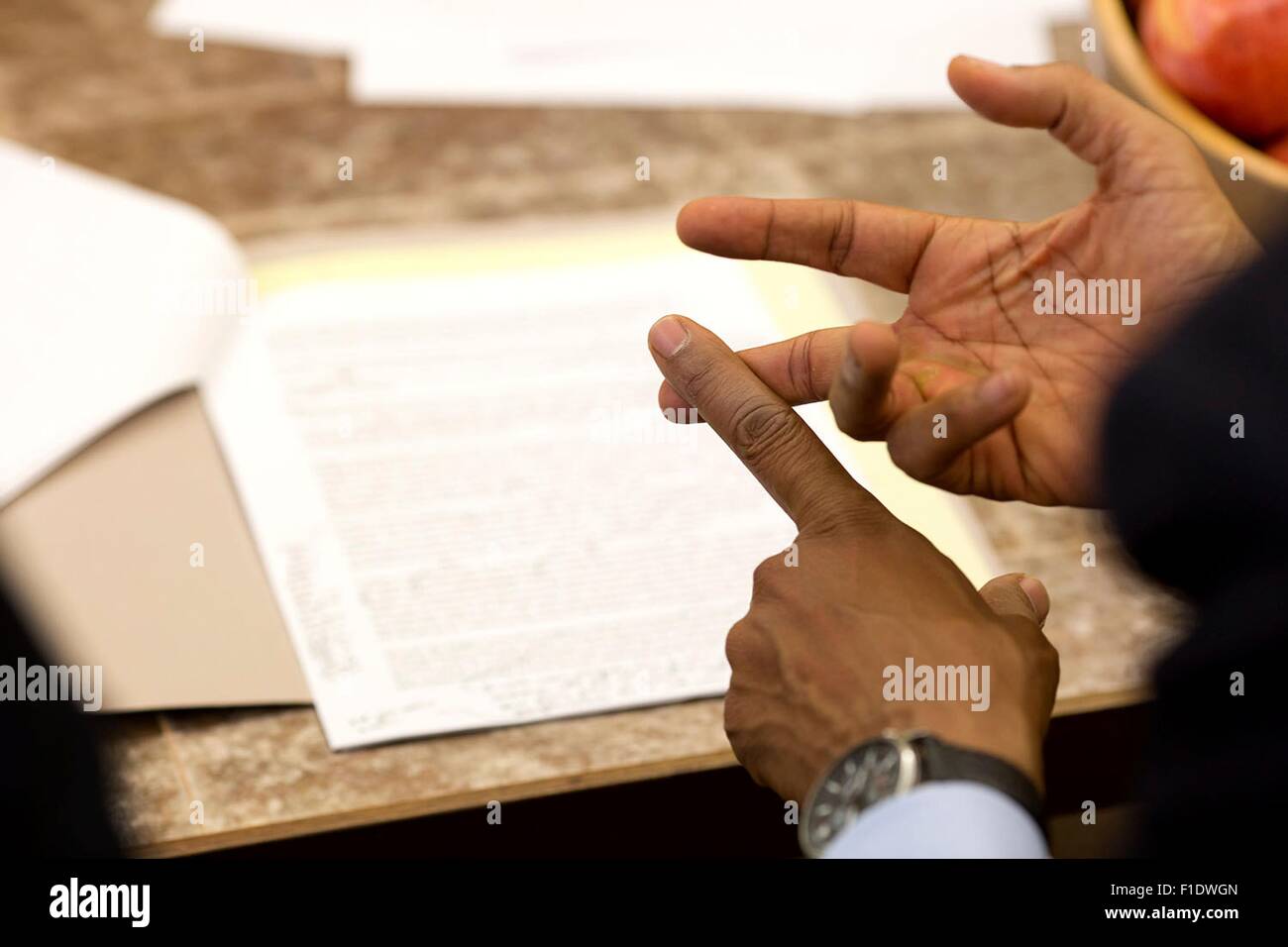 U.S. President Barack Obama hand gestures during State of the Union prep in the Oval Office of the White House January 14, 2015 in Washington, DC. Stock Photo