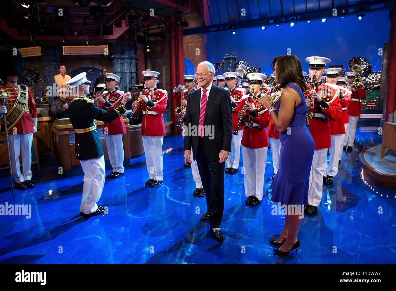 U.S. First Lady Michelle Obama surprises host David Letterman with a performance by the United States Marine Band on The Late Show with David Letterman April 30, 2015 in New York, N.Y. Stock Photo