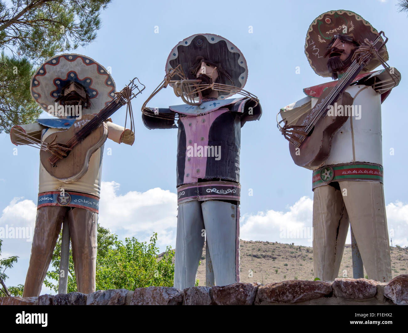 Metal sculptures of traditional Mexican mariachis in Baines Park, a