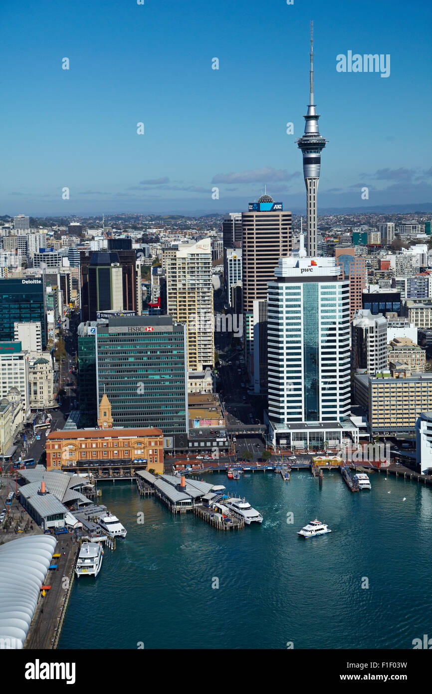 Passenger ferry terminal, Sky Tower, and waterfront, Auckland, North Island, New Zealand - aerial Stock Photo