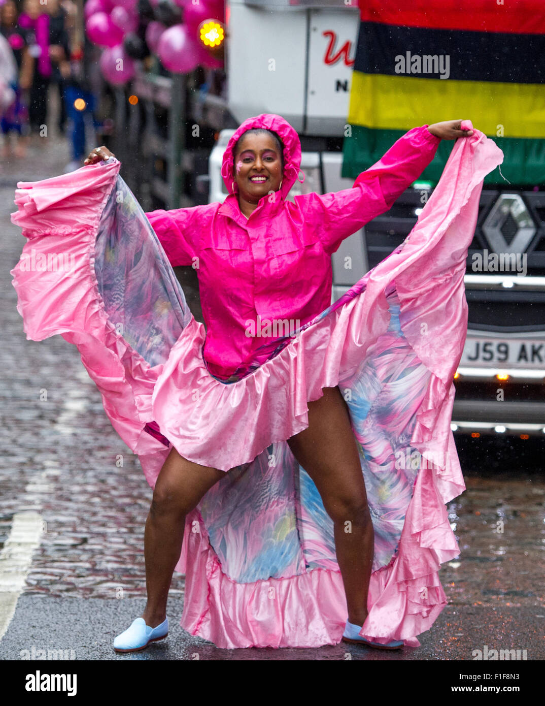 London, UK. 31 August, 2015. Performers in costumes dancing along the