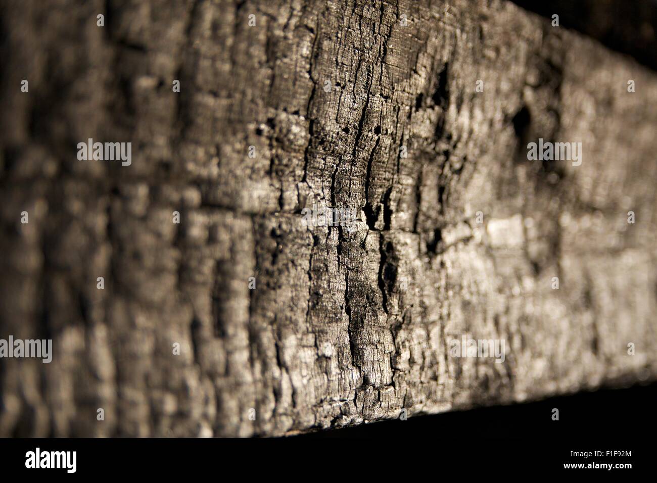 Burn wooden beam Stock Photo