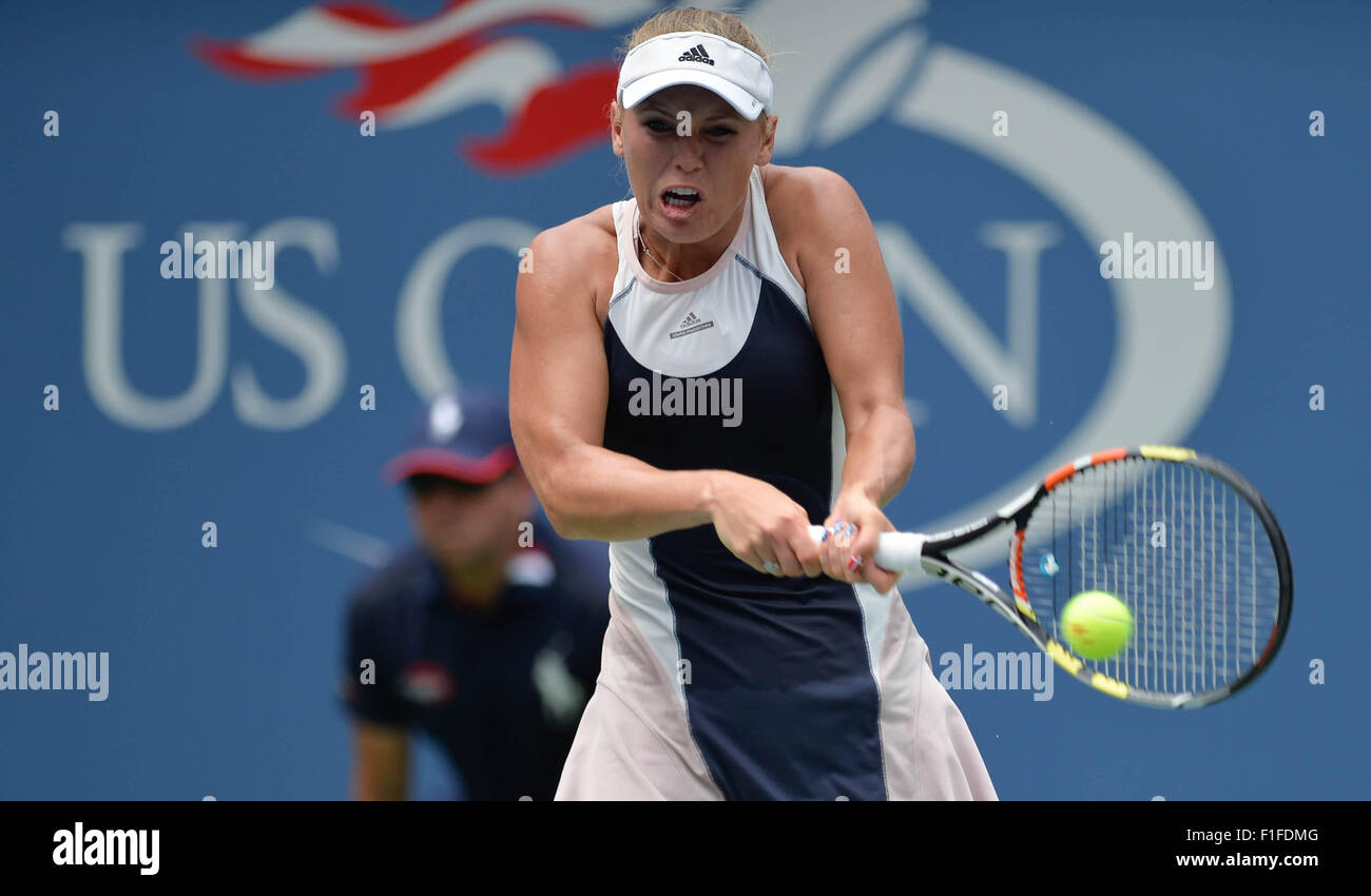New York, USA. 1st Sep, 2015. Caroline Wozniacki of Denmark returns a shot to Jamie Loeb of the United States during their women's singles first round match at the 2015 US Open Tennis Tournament in New York, the United States, Sept. 1, 2015. Wozniacki won 2-0. © Bao Dandan/Xinhua/Alamy Live News Stock Photo