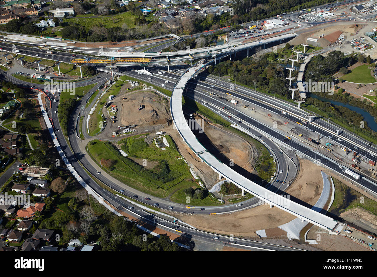 North-Western Motorway and construction of Waterview Connection, Auckland, North Island, New Zealand - aerial Stock Photo