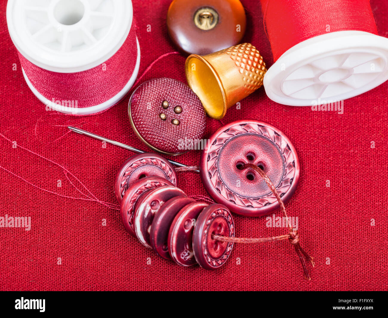 dressmaking still life - top view of bobbins with sewing thread ...