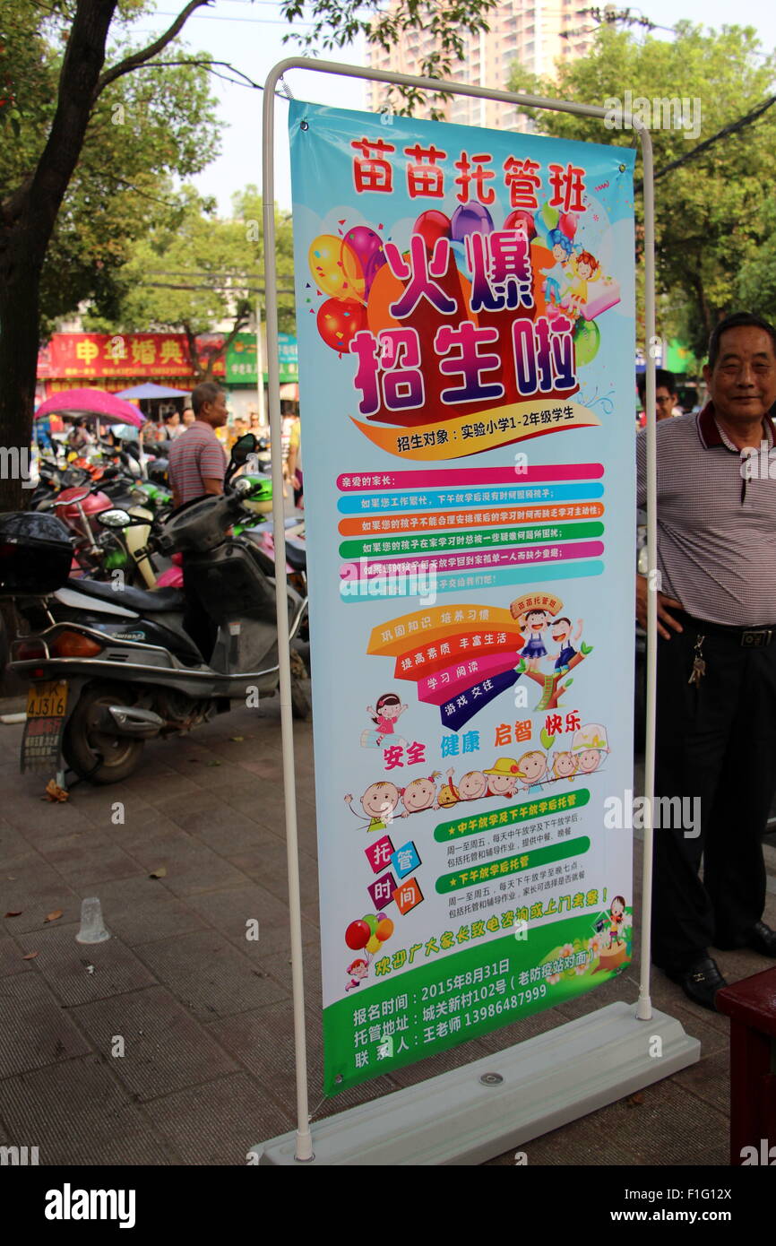 Xiaogan, Hubei, CHN. 1st Sep, 2015. Xiaogan, CHINA - September 1 2015: (EDITORIAL USE ONLY. CHINA OUT) September 1 is the first day of the new semester, and nursery ads can be found everywhere in Xiaogan. Parents may be still working when children leave school so it is a big problem to look after children. And nurseries solve the problem. Meanwhile, how to standardize a nursery's management became a new challenge. © SIPA Asia/ZUMA Wire/Alamy Live News Stock Photo