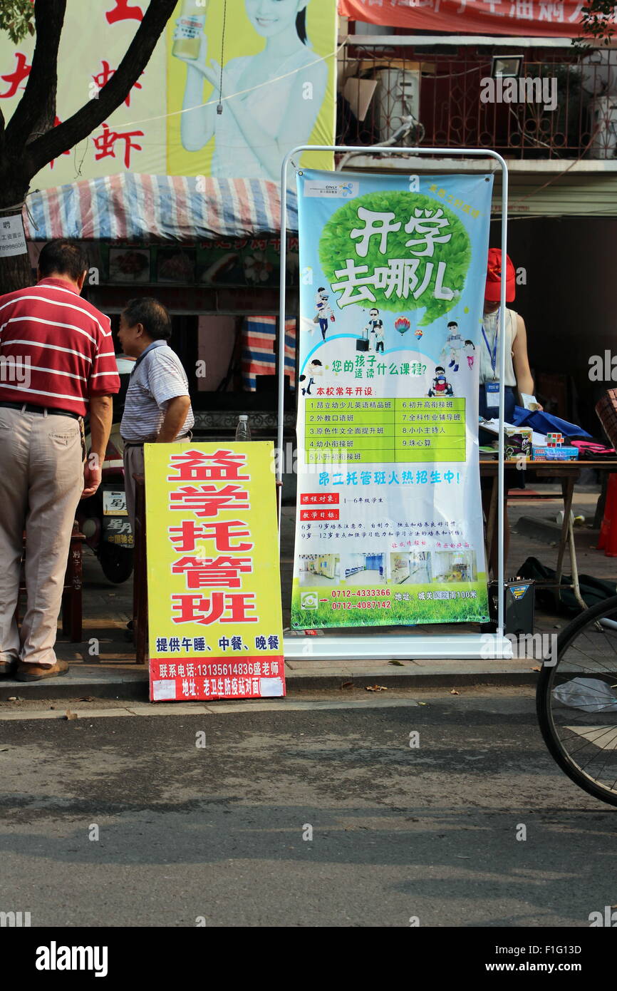 Xiaogan, Hubei, CHN. 1st Sep, 2015. Xiaogan, CHINA - September 1 2015: (EDITORIAL USE ONLY. CHINA OUT) September 1 is the first day of the new semester, and nursery ads can be found everywhere in Xiaogan. Parents may be still working when children leave school so it is a big problem to look after children. And nurseries solve the problem. Meanwhile, how to standardize a nursery's management became a new challenge. © SIPA Asia/ZUMA Wire/Alamy Live News Stock Photo