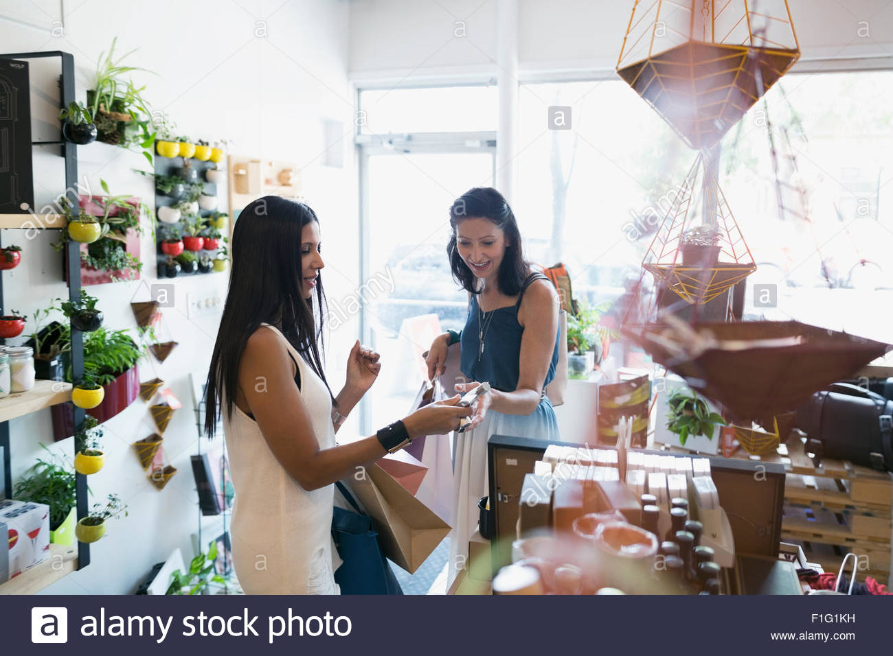 Women shopping in housewares shop Stock Photo