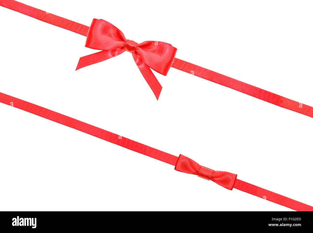 red satin bow and knot and two diagonal ribbons isolated on horizontal ...