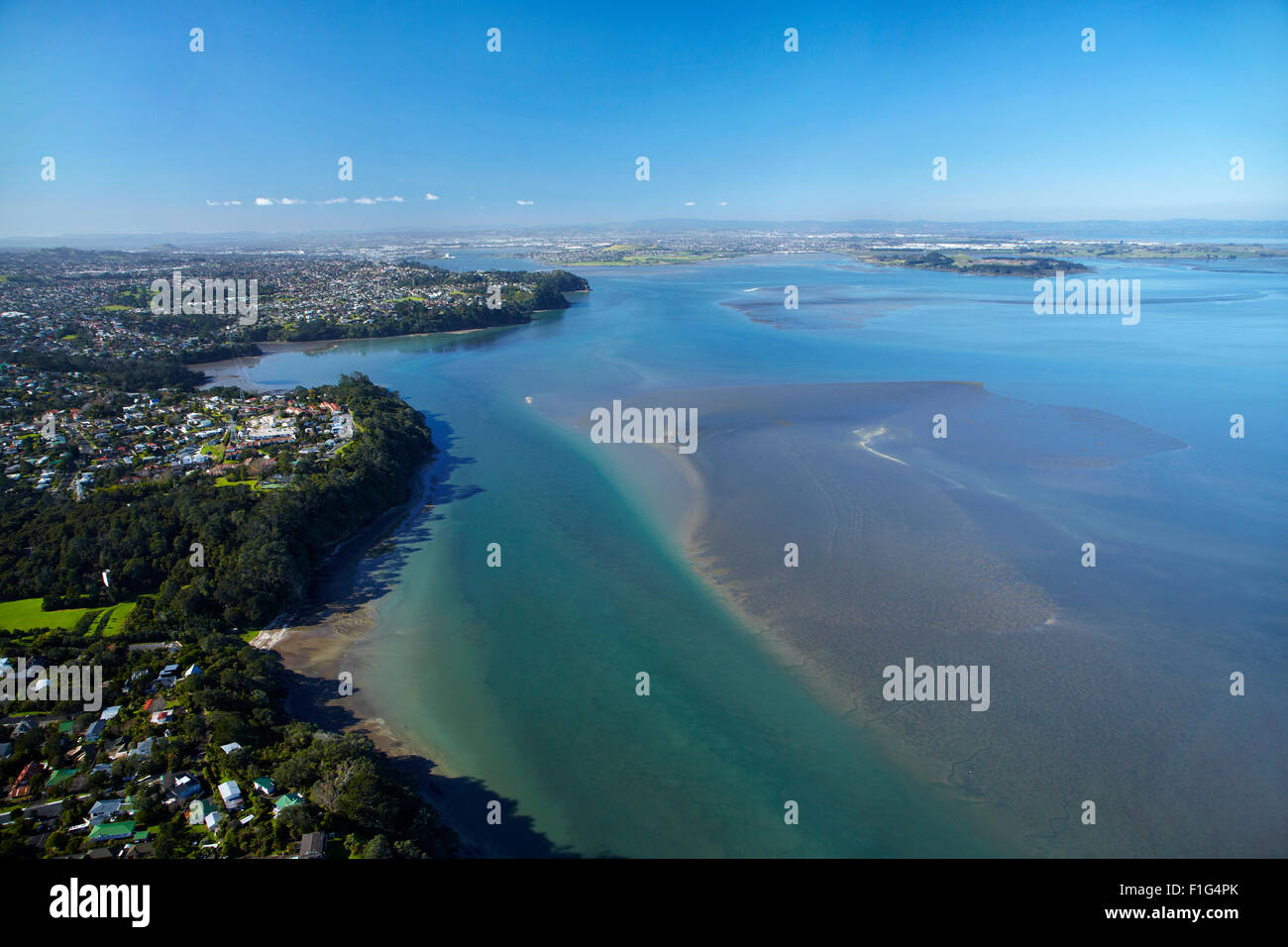Manukau Harbour, Green Bay and Blockhouse Bay, Auckland, North Island, New Zealand - aerial Stock Photo