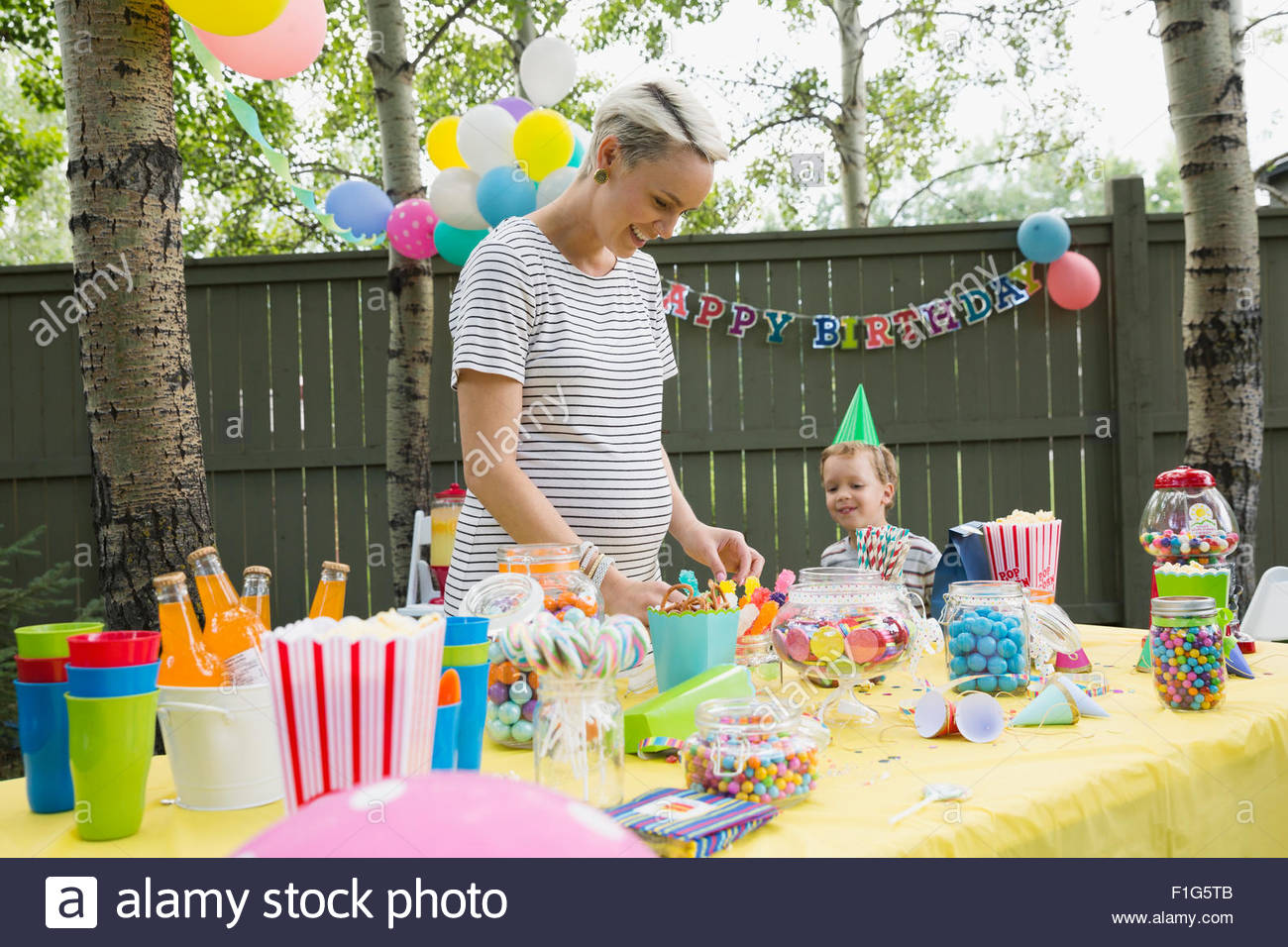 red and green jelly set in plastic cups on a tray in preparation for a  childrens party Stock Photo - Alamy