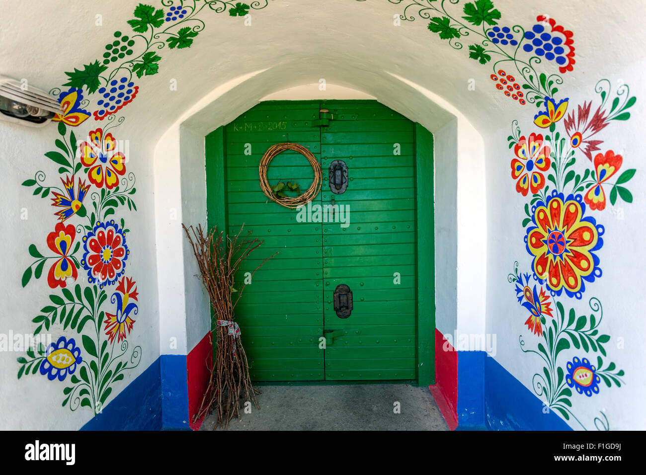 Wine cellar, Petrov Plze, The entrance to the cellar is decorated with folk motifs Czech Republic, Europe Wine cellar Stock Photo