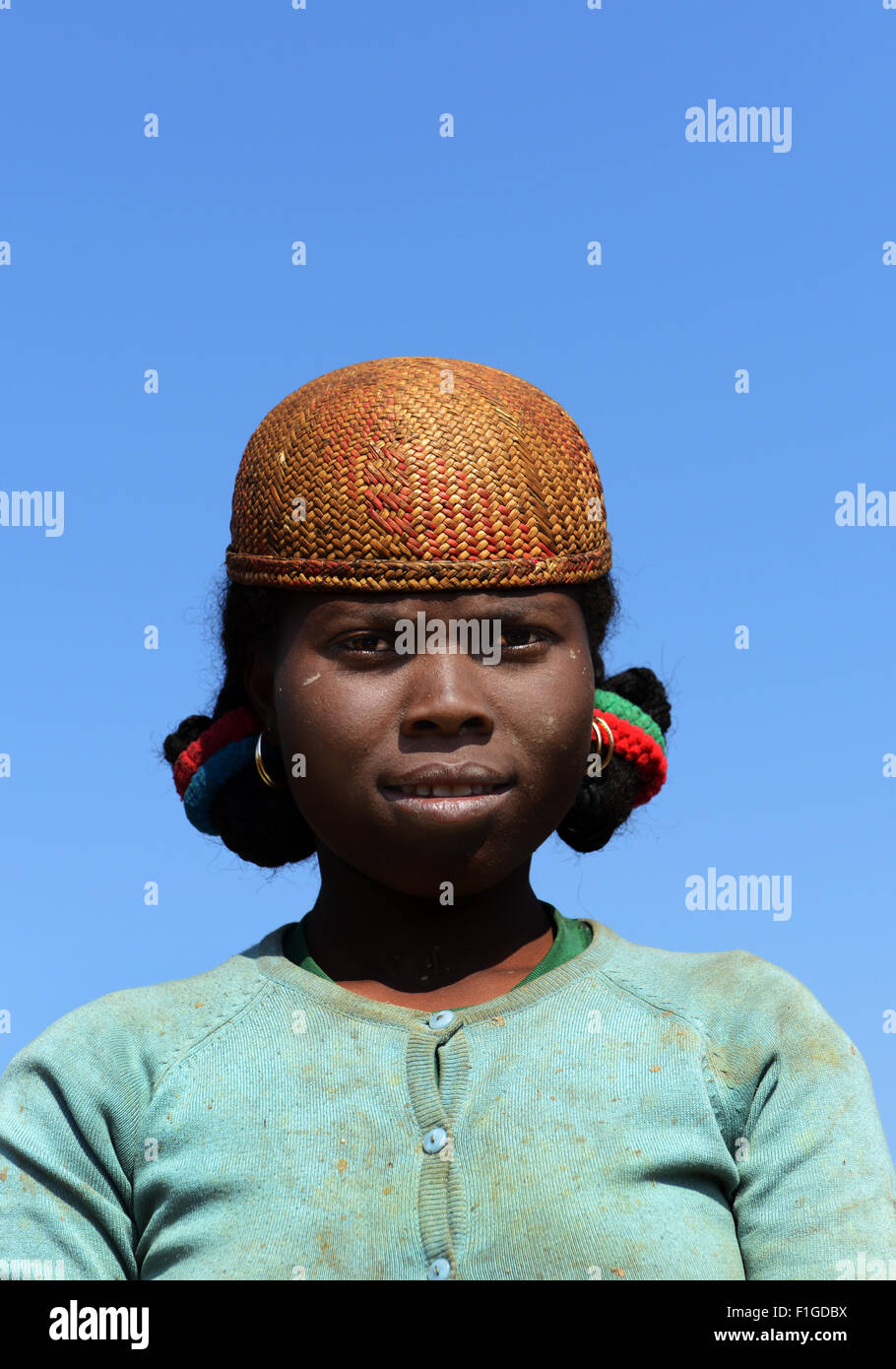 A betsileo woman wearing a traditional betsileo hat. Stock Photo