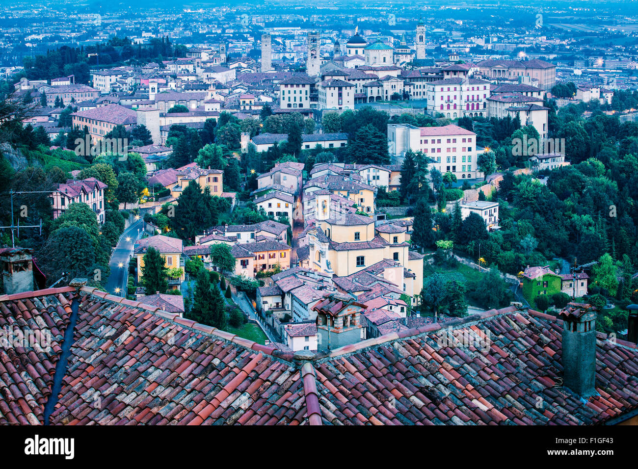 Panorama of the center of Bergamo seen at evening time from Bergamo Alta, Italy Stock Photo