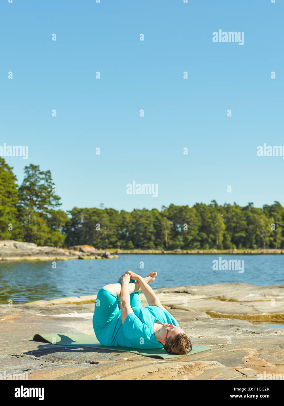 real-life-fitness-training-mature-woman-training-outdoor-vertical