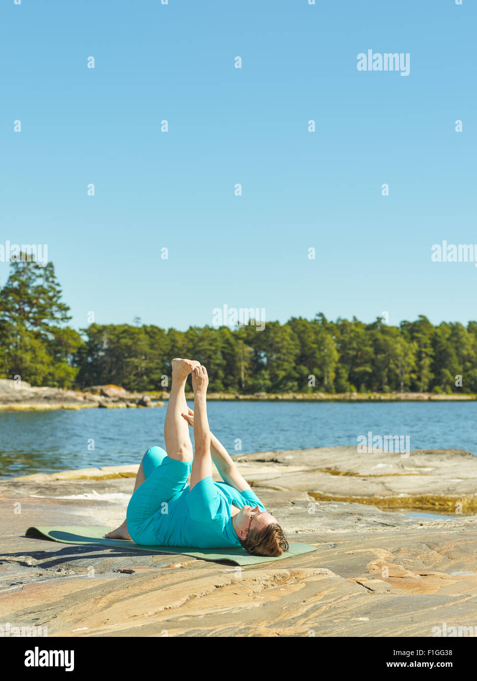 real-life-fitness-training-mature-woman-training-outdoor-vertical