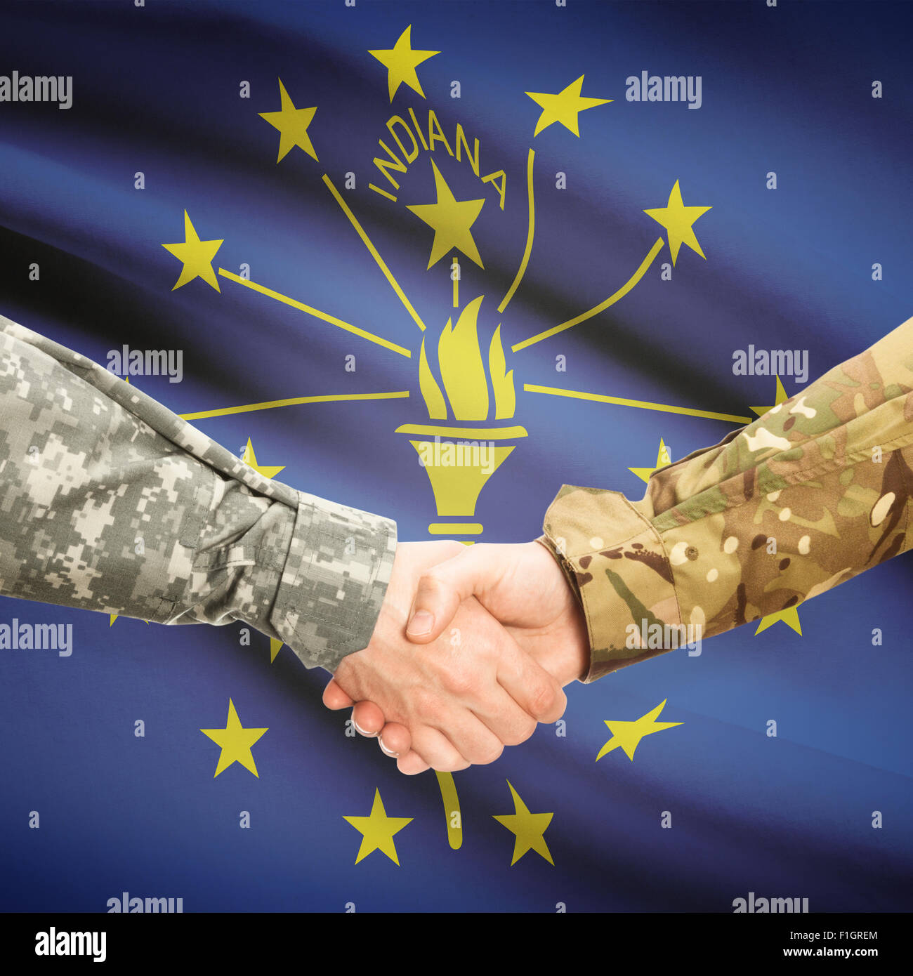 Soldiers handshake and US state flag Indiana Stock Photo Alamy