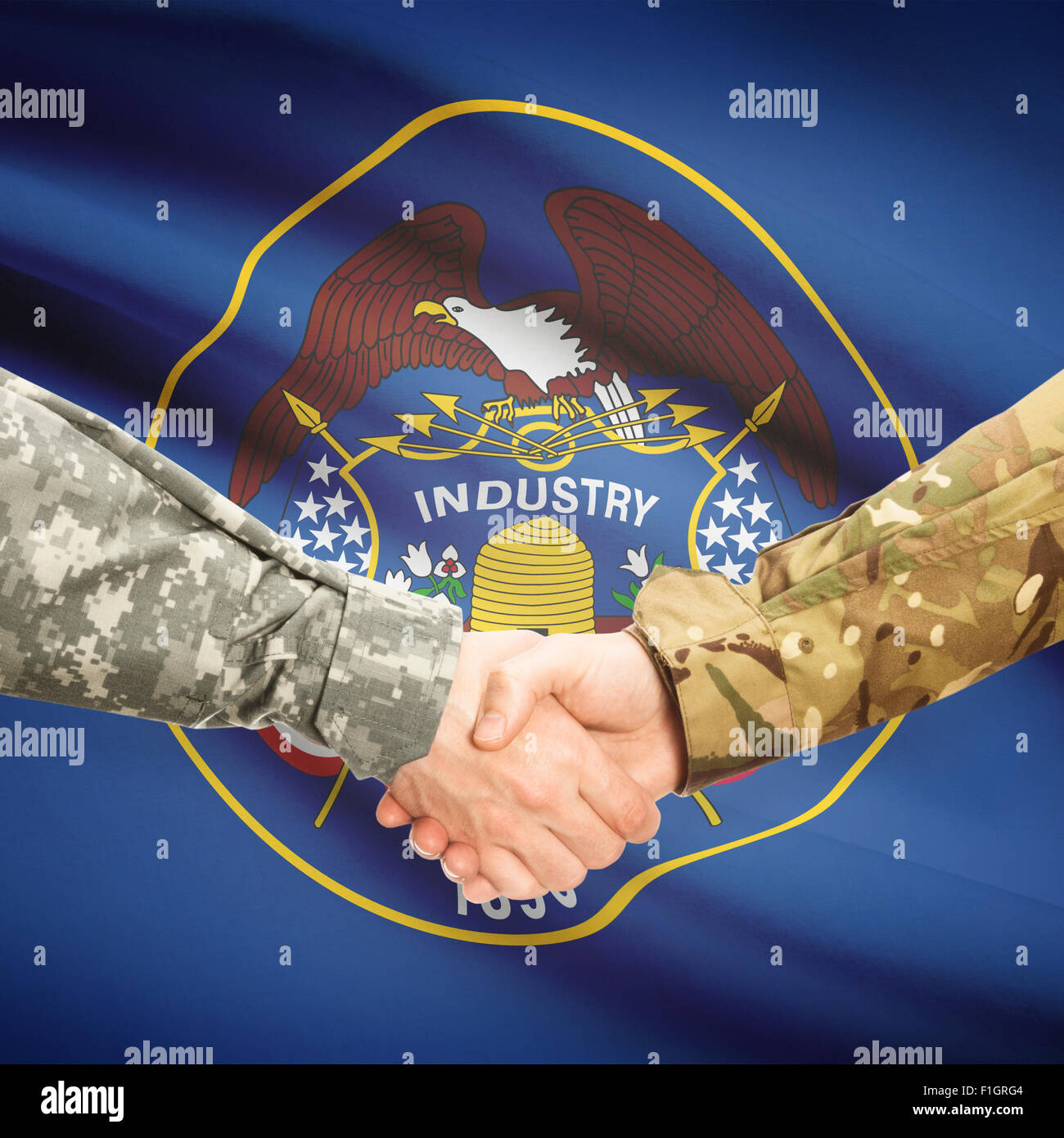 Soldiers handshake and US state flag Utah Stock Photo Alamy