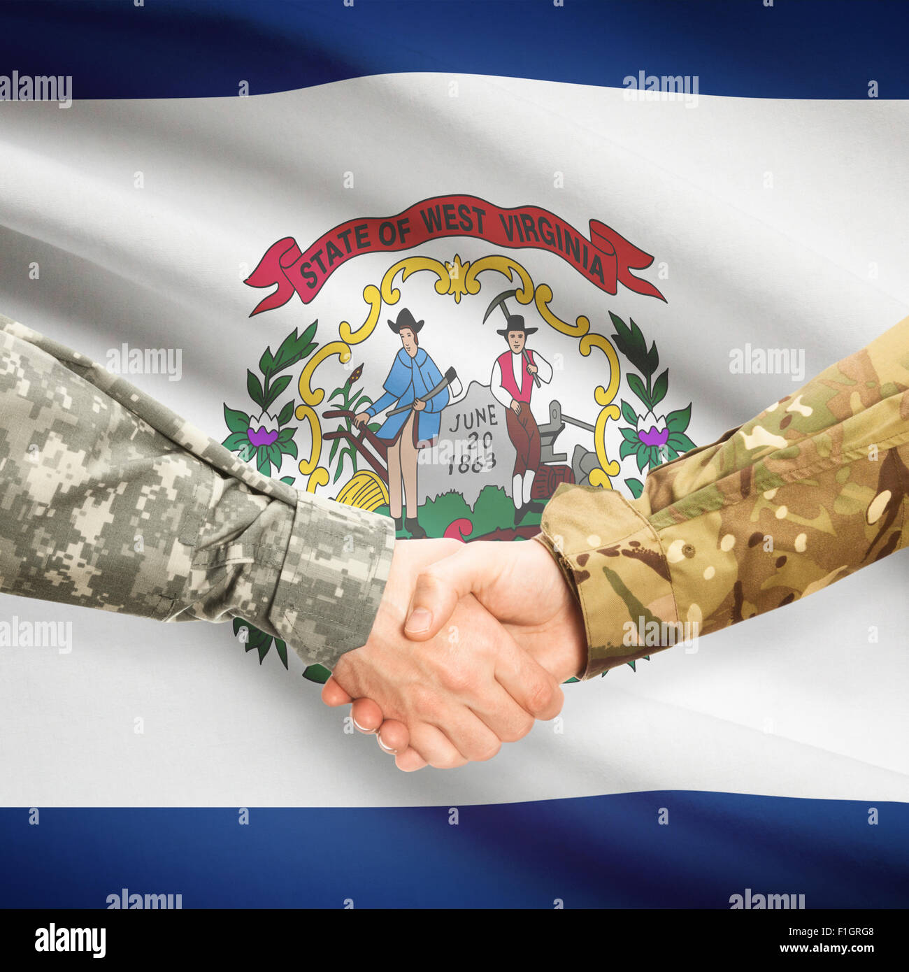 Soldiers handshake and US state flag West Virginia Stock Photo Alamy