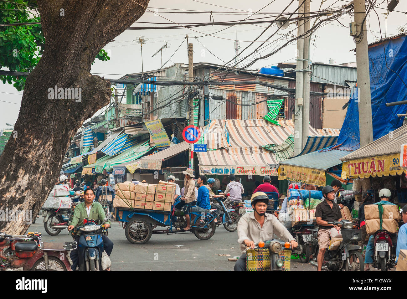 Vietnam street market, a busy street scene in the downtown Cholon area of Ho Chi Minh City, Saigon, Vietnam. Stock Photo