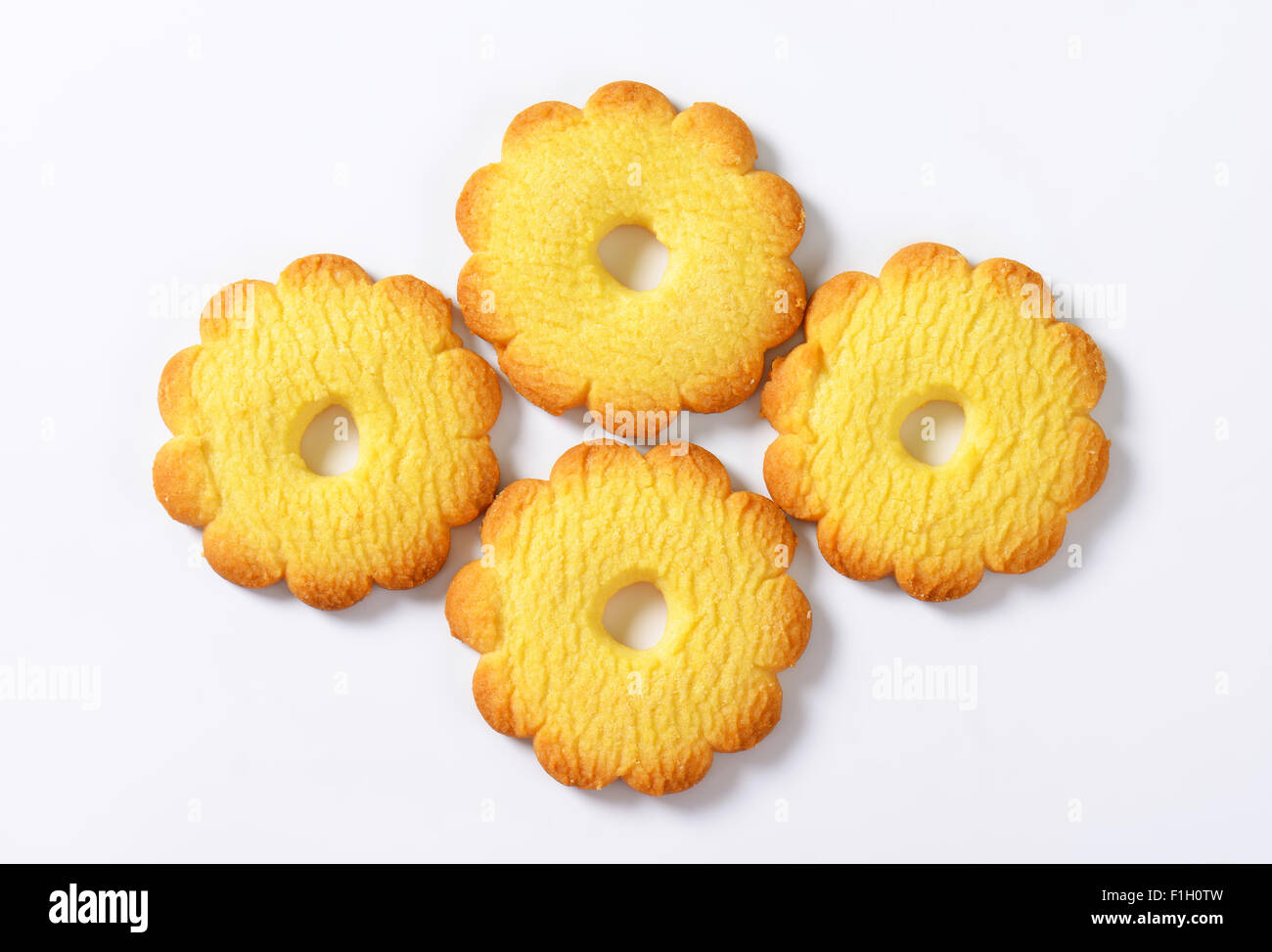 four italian butter cookies Canestrelli on white background Stock Photo