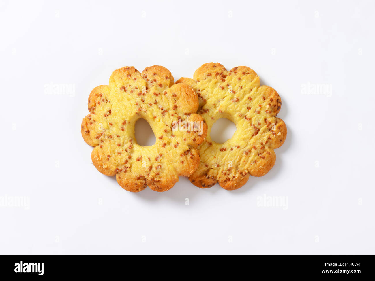 two italian butter cookies Canestrelli on white background Stock Photo